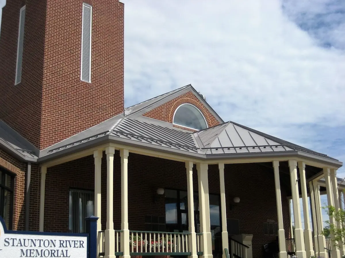 Skilled roofing craftsmen working on a residential roof in Hattiesburg